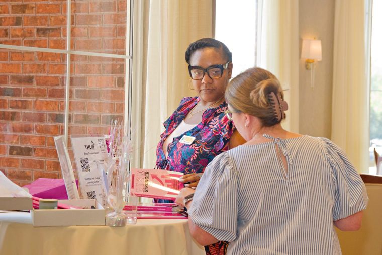 Readers with the Rise Stronger book